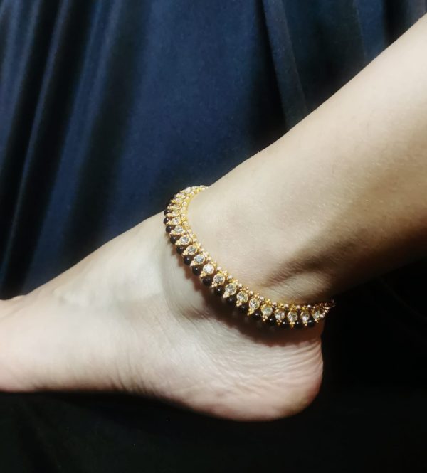 Tobilleras negro con dorado